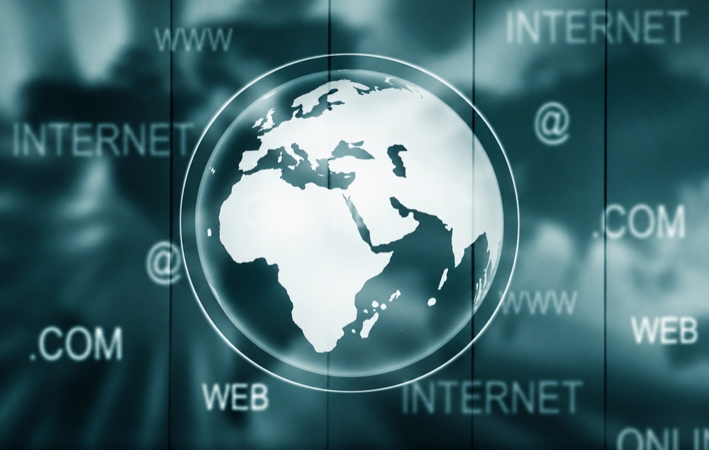Globe surrounded by internet and domain names